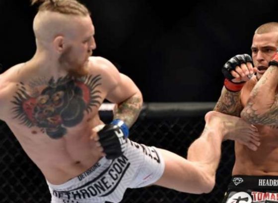 Mekgregor slomio nogu, Poirije slavio nakon dominacije